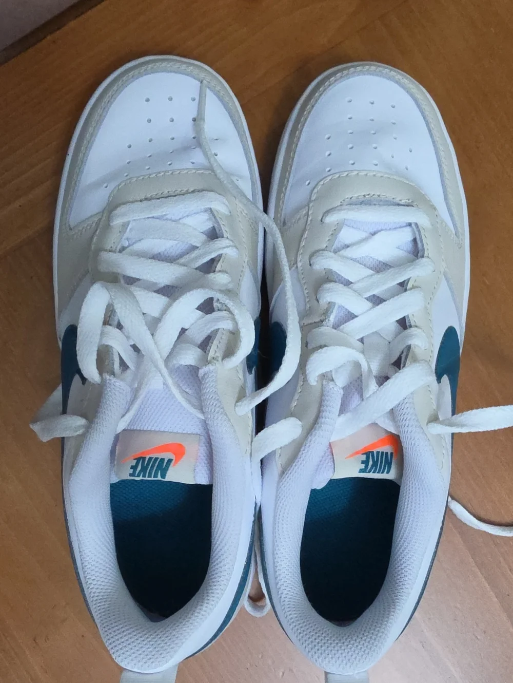 Nike Kids White Sneakers with Teal Swoosh